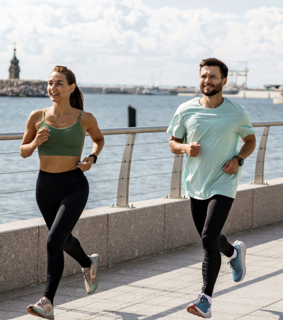 red light athlete recovery models running over bridge in new york